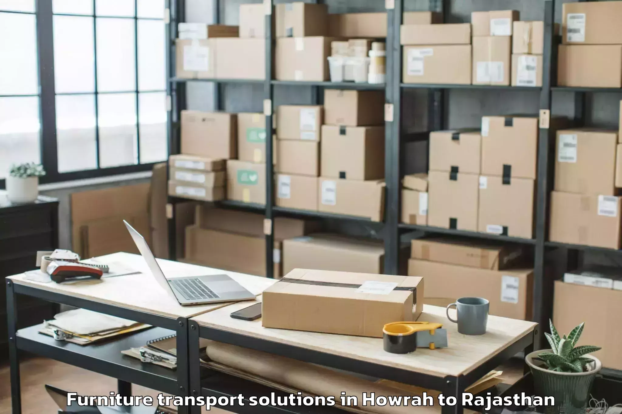 Book Howrah to Barmer Furniture Transport Solutions Online